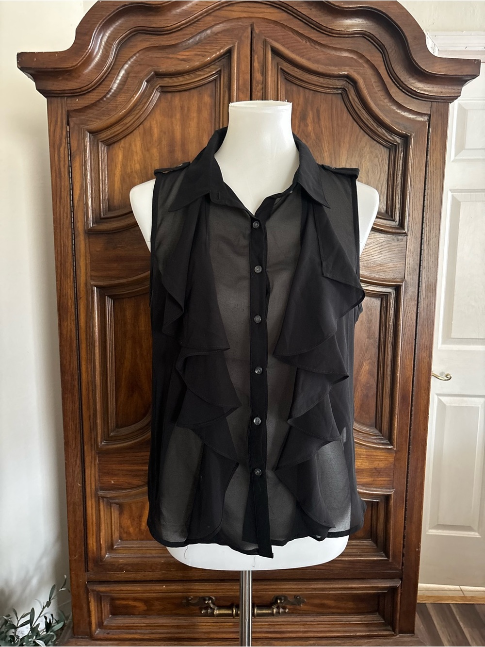 Have Black sheer button up blouse with front ruffle